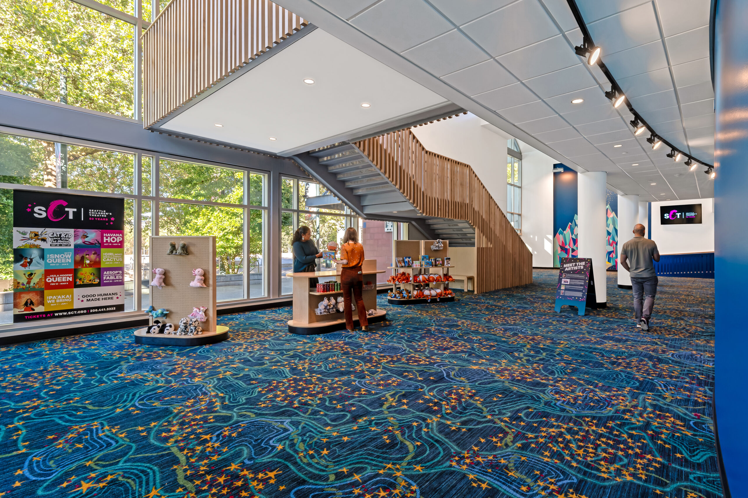 Lobby Pic Rendering of remodeled entrance to the Eve Alvord Theatre, feature updated carpet and paint