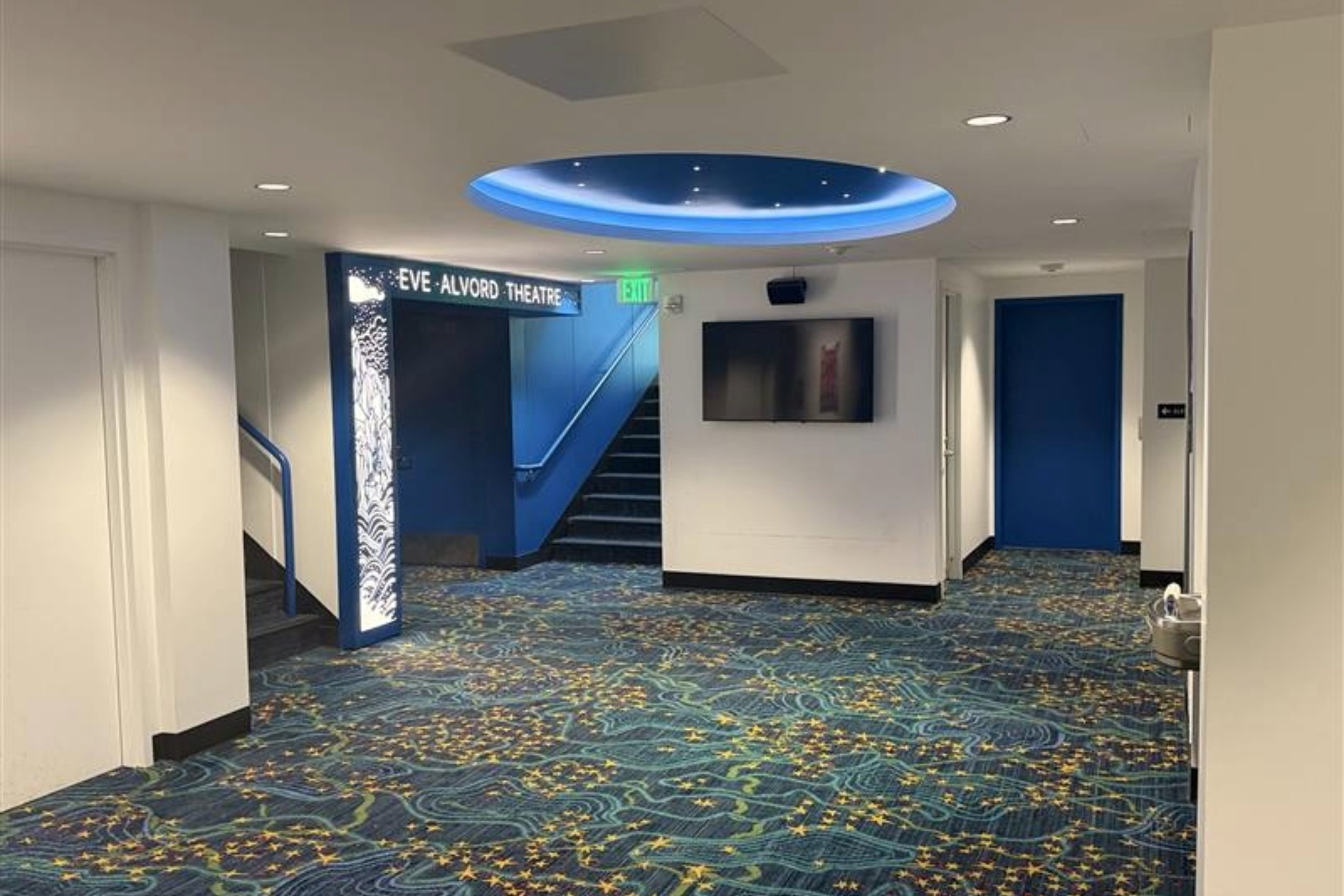 Eve Alvord Lobby Photo Photo of remodeled entrance to the Eve Alvord Theatre, feature updated carpet and paint